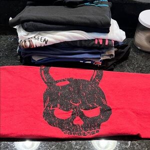 Red Skull Graphic Muscle Tee
10 different tanks in bundle